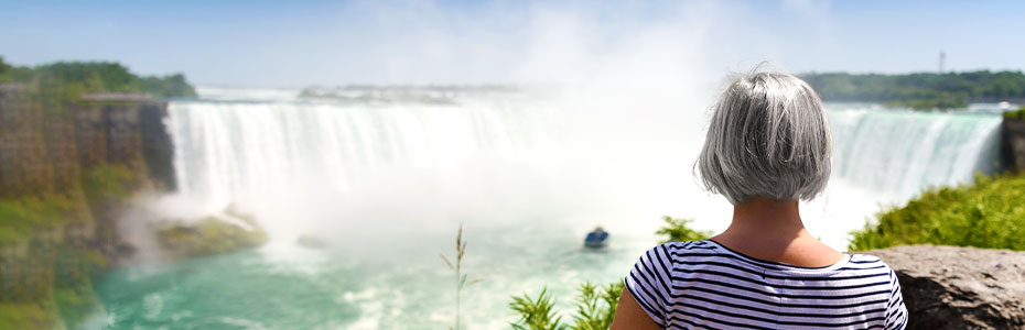 Woman looking over Niagara Falls