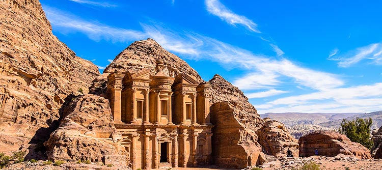 The lost city of Petra against a sunny blue sky