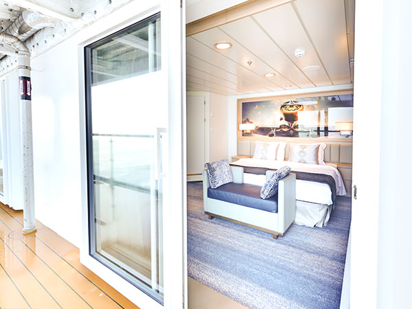 Ocean Explorer, Category OS, Owner's Suite, View of Inside Bedroom from the balcony