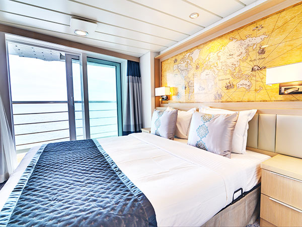 Ocean Explorer, Category TFS, Deluxe Veranda Forward Stateroom, View of Bed and Veranda