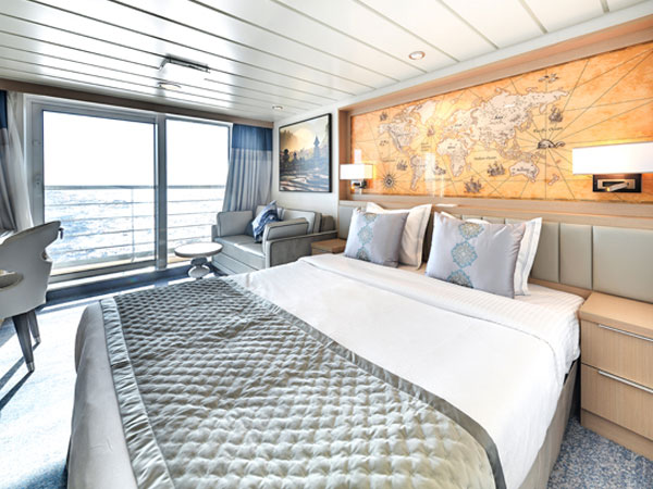 Ocean Explorer, Category TS, Deluxe Veranda Stateroom, View of Bed and Veranda