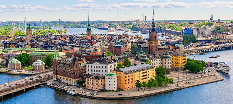 Small Ship Ocean Cruise from Copenhagen to Stockholm | Jewels of Scandinavia, Baltic Capitals & St. Petersburg | Aerial view of the city of Stockholm, Sweden on a clear day