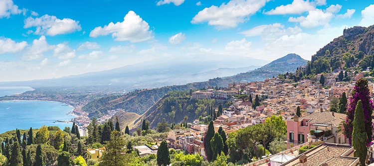 Beautiful panorama of mountains and shore in ancient Taormina, Italy